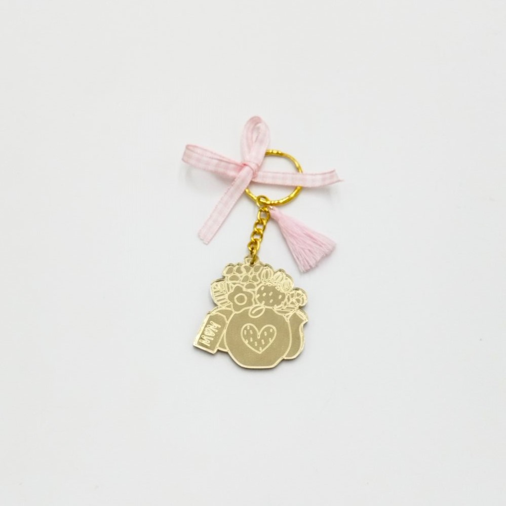 Keychain made from gold mirror plexiglass, featuring a pitcher with flowers and pink details - 2